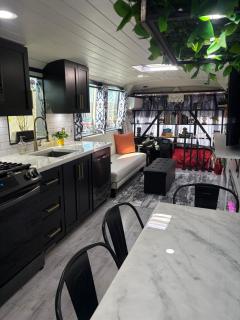 Sleek, Modern, Pet Friendly Custom Tour Bus! - 0