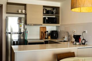 Modern 1BR, High-Speed WiFi, Shopping del Sol - 7