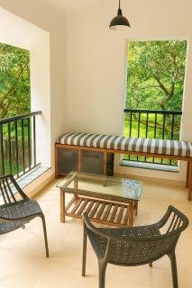 Modern Coastal Stay Airy 1BHK with Balcony - 9