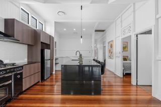 Elegant Dual-Level Home Near Cafés, Parks & River - 5