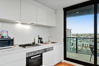 Bright Apartment with City Views in Trendy Locale - 8