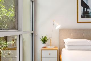 Charming Modern Apartment with City Views - 1