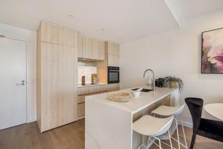 Chic 1-Bed with Parking, Gym, Pool & City Views - 9