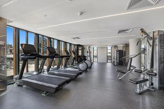 Chic 1-Bed with Parking, Gym, Pool & City Views - 7