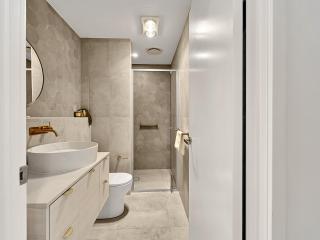 Modern 1-Bedroom Apt with Sweeping Water Views - 1