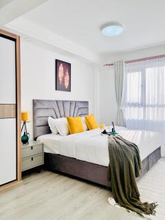 luxury elegant furnished three bedroom apartment with children playing ground,swimming pool relaxing rooftop with amazing city views, ample parking space and proximity to major shopping malls - 3