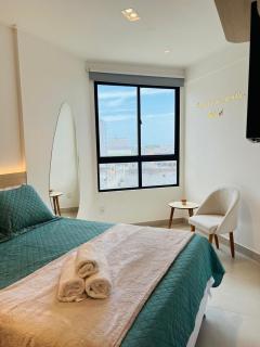 Apto 1 Quarto + Sala para 4 Pessoas – Piscina, Jacuzzi, e Acesso à Praia - 5