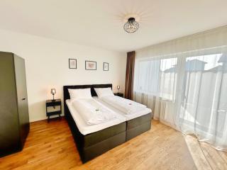 Basilisk Homes - in Grenzach-Wyhlen bei Basel - 4 x Moderne Fewos je 1bis2, 1bis4 oder 1bis6 Pers mit Küche und Balkon oder Terrasse - Parkplätze vorhanden - 5