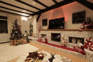 Luxury Christmas House with Fireplace, Full Festive Décor & Optional Hot Tub - 0