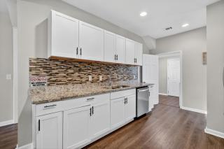 Spacious 4BR Mozley Park Home with Fenced Yard home - 1