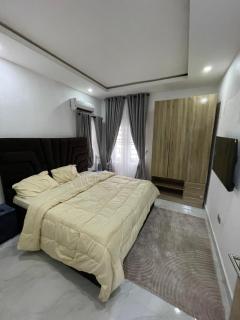 2 bedroom apartment with steady light in a call to access estate, swimming pool, internet access at Ikota - 6