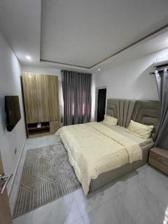 2 bedroom apartment with steady light in a call to access estate, swimming pool, internet access at Ikota - 2