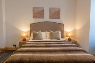 Elegant Neutral Bedroom with Ambient Lighting - 0