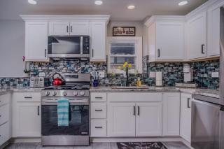 The Riverwalk Retreat on the Fox Waterfront Vacation Rental in Downtown McHenry 3BR 2BA Home with Private Pier - 1