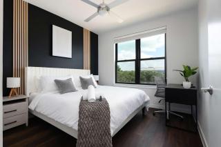 Stylish Downtown 2BR Retreat with Parking and Pool - 7