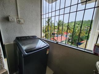 Luxury 2BHK Nature Retreat in Candolim with Pool Access, Nature Views & Fully Equipped Kitchen - 1