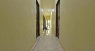 OYO 90596 Casaria Inn - 3