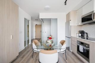 Elegant 2BR Condo with 55 TV & City Views - 7