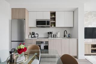 Elegant 2BR Condo with 55 TV & City Views - 5