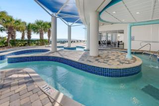 Beachfront condo w hot tub & pool - 9