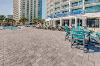 Beachfront condo w hot tub & pool - 7