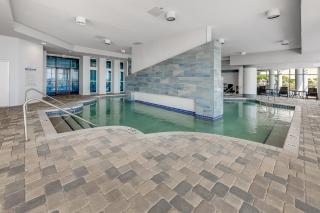 Beachfront condo w hot tub & pool - 5