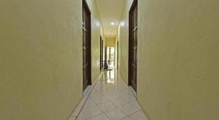 OYO 90596 Casaria Inn - 1