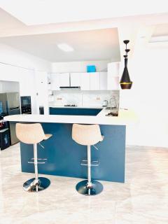 celestial two bedroom apartment with swimming pool fully equipped gym ample parking space children playing ground and a relaxing well manicured garden area for relaxing - 5