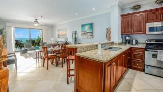 Elegant Oceanview Condo with Spacious Open-Concept Floor Plan and Inviting Beach Design - 5