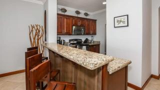 Elegant Oceanview Condo with Spacious Open-Concept Floor Plan and Inviting Beach Design - 4