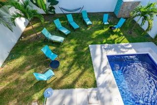 Ultramodern Townhome with an Inviting Coastal Design and Lush Outdoor Oasis with a Private Pool - 3