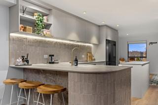 Spacious Coastal Luxe Home with Sea View and Parking - 5