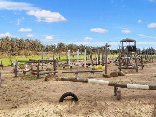 Cabin in camping resort with patio - 1