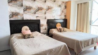 Suite en torres gemelas con vista al mar - 4