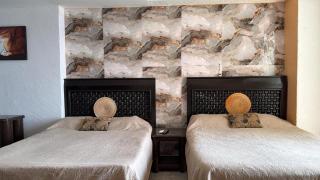 Suite en torres gemelas con vista al mar - 5