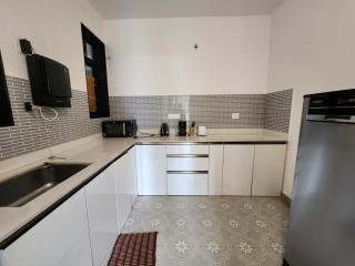 Cozy 1BHK Candolim Stay - Pool, WiFi & Balcony for Workations and Holidays - 1