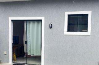 Suíte privativa aconchego a alguns passos da praia - 0