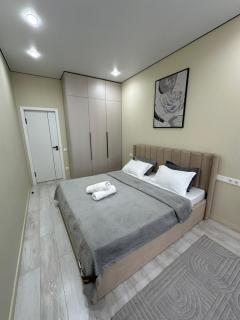 Светлая и стильная квартира в Алматы рядом с метро - 1