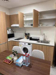 Bright 1BR with Balcony Near Airport - 2