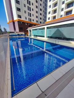 stunning one bedroom apartment with heated swimming pool fully equipped gym ample parking space and a relaxing rooftop with breathtaking views - 9