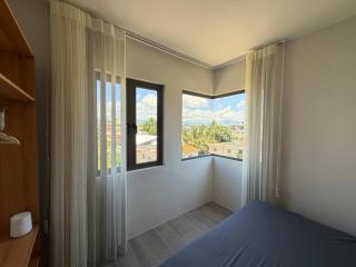 Modern 2BR Apartment with Mountain View, Near Beach - 8