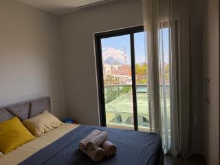 Modern 2BR Apartment with Mountain View, Near Beach - 4
