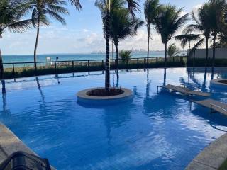 Apto 4q2s pé na areia acomoda até 7 - 8