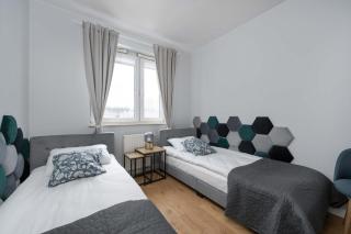 Bright Two Bedroom Apartment in Wrocław with Air Conditioning and Parking by Noclegi Renters - 5
