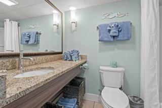 Caravelle Resort Unit 409 with Resort Pool and Ocean Views from Balcony - 1