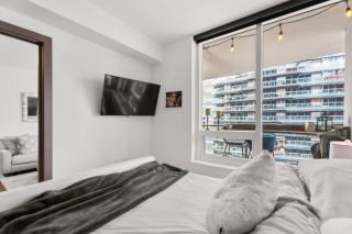 Modern Chic Apartment with Balcony & Workspace - 1