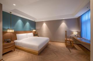 Qingdao Xinduxin Manxin Hotel - 0