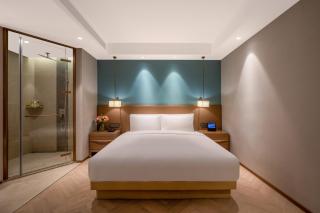 Qingdao Xinduxin Manxin Hotel - 9