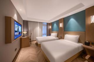 Qingdao Xinduxin Manxin Hotel - 8