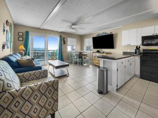 Leeward II 3 l Beachfront Condo l Large first level deck with steps down to sand - 9